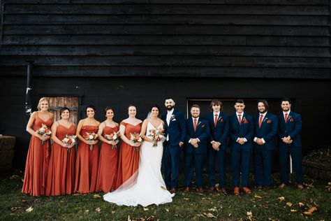 Blue Bridesmaid Dress With Orange Flowers, Terracotta Navy Blue Wedding Decor, Navy Blue And Terracotta Groomsmen, Navy Blue And Rust Bridesmaid Dresses, Terracotta Wedding With Navy, Navy Blue And Copper Bridesmaid Dresses, Navy Blue And Terracotta Wedding Table Decor, Terracotta And Blue Wedding Palette, Blue And Cinnamon Wedding