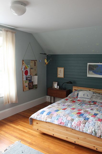 This quilt.. Painting Wood Paneling, Bed Light, Colorful Quilt, Attic Room, Attic Bedrooms, Upstairs Bedroom, Bungalow Design, Bedroom Master, Attic Bedroom