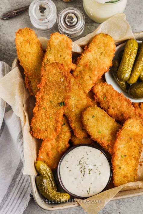 This homemade recipe for fried pickles is easy to make and oh-so delish. Everyone loves some deep-fried dill spears or slices with ranch dressing or dip! The batter is so easy to make, too. Quick, easy, and delish for snacks or appetizers. Enjoy with all those favorites for game day. #friedpickles #spendwithpennies #recipeeasy #recipedeepfryer Easy Deep Fried Pickles, Fried Dill Pickles Recipe, Fried Dill Pickles, Deep Fried Pickles, Fried Pickles Recipe, Spend With Pennies, Seasoned Bread Crumbs, Taco Dip, Fried Pickles