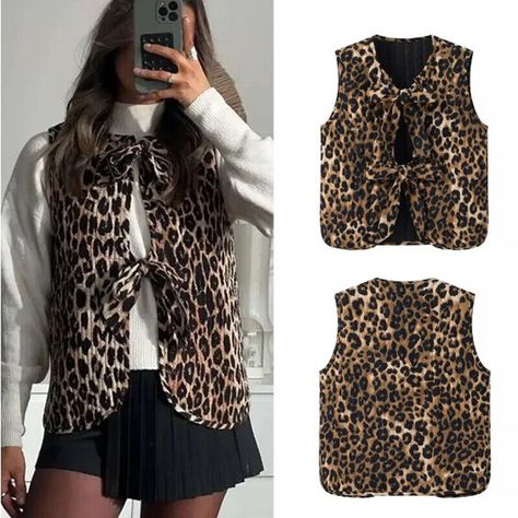 Details THIS SHORT LEOPARD PRINT & BOWS WAISTCOAT VEST IS A STYLISH ADDITION TO ANY OUTFIT. WITH ITS BOLD ANIMAL PRINT AND ELEGANT BOW DETAILS, IT ADDS A TOUCH OF SOPHISTICATION AND TRENDINESS. MADE FROM HIGH-QUALITY MATERIALS, IT IS COMFORTABLE AND DURABLE. ELEVATE YOUR WARDROBE WITH THIS MUST-HAVE PIECE. Shipping Policy Payment Method Returns Policy Shipping Policy 1. Item will be shipped 24-48 hours after full payment is received. 2. eBay’s estimated delivery date can only be considered as an average delivery date (some orders may be quicker, some may be slower). 3. The shipping time is about 3 to 10 business days exclude Sat and Sun. 1. Item will be shipped 24-48 hours after full payment is received. 2. eBay’s estimated delivery date can only be considered as an average delivery date ( Leopard Vest Outfit, Leopard Vest, Waistcoat Outfit, Leopard Print Bow, Spring Women, Vest Outfits, Winter Looks, Must Haves, Leopard Print