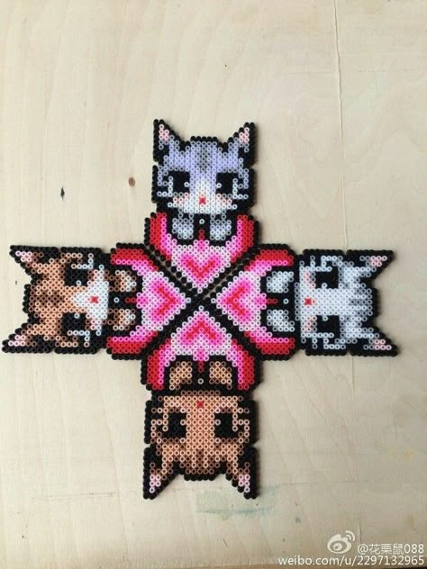 cats perler bead Hama Bead Cat Pattern, Perler Beads Cats, Cat Bead Patterns, Therian Perler Bead, Pyssla Cat, Fuse Bead Art, Perler Beads Animals, Cat Perler Bead Patterns, Kitty Perler Beads