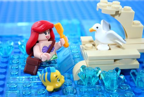 https://flic.kr/p/GUyJYV | Lego The Little Mermaid A Dinglehopper | See a picture you would like to have as a shirt? www.redbubble.com/people/xxdeadmanzz/portfolio Lego Mermaid, Disney Lego Minifigures, Disney Lego, Disney Characters Christmas, Lego House Ideas, Lego People, Lego Robot, Lego Minifigs, Lego Pictures