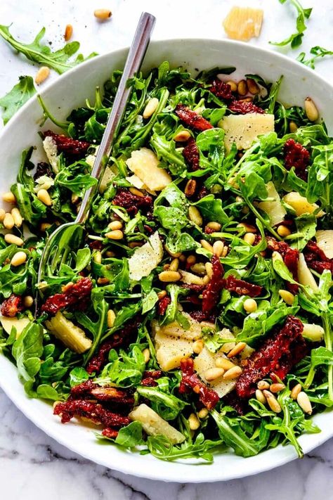 Arugula Salad with Sun-Dried Tomatoes and Pine Nuts | foodiecrush.com Salad Sun Dried Tomatoes, Pine Nuts Salad, Greek Marinated Chicken, Easy Asparagus Recipes, Pine Nut Recipes, Grilled Asparagus Recipes, Arugula Salad Recipes, Salad Recipes Healthy Easy, Side Salad Recipes