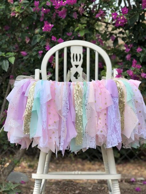 Beautiful premium highchair banner chalk full of beautiful fabrics! Unicorn high chair banner made with white lace, pink and white chiffon, bubble gum pink fabric, lavender fabric, lavender tulle, mint fabric, and gold sequin strips come together to create this beautiful high chair banner! Use for Birthday Banner Diy, Highchair Tutu, High Chair Decorations, Diy Chair Covers, High Chair Tutu, Diy Dessert, Diy Birthday Banner, Banner Diy, Pastel Birthday