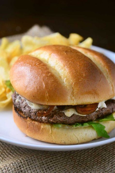 A juicy cheese burger topped with whiskey caramelized mushrooms, onions and soft and creamy Dubliner cheese. Steak And Whiskey, Dubliner Cheese, Easy Burgers, Chopped Steak, Cheeseburger Recipe, Burger Dogs, How To Cook Burgers, How To Cook Mushrooms, Cheese Burger