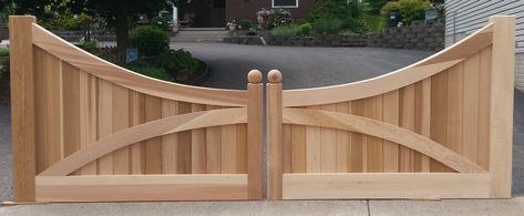 Custom Concave Wooden Driveway Gate made out of Western Red Cedar Driveway Gate With Door, Driveway Gate Diy, Entrance Gates Driveway, Wood Gates Driveway, Cedar Gate, Gates Driveway, Wooden Gates Driveway, Custom Driveway, Gate Entrance