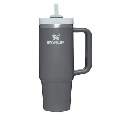 This Stanley Quencher H2.0 is generously sized (but not oversized) with an easy-carry, comfort-grip handle and a narrow base that will fit most cup holders. Long day of meetings? Rowing class? Trip out of town? Stanley's durable 30 oz. tumbler, made with recycled stainless steel, is up to the hydration challenge. The double-wall vacuum insulation will keep your water cold for 9 hours and iced for 40 hours. And to cap things off, there?s an advanced FlowState? lid that features a rotating cover with three positions: a straw opening designed to resist splashes with a seal that holds the reusable straw in place, a drink opening, and a full-cover top. Color: Gray. Hydration Challenge, Stanley Water Bottle, Trendy Water Bottles, Pink Cups, Stanley Quencher, Hearth And Hand, 30 Oz Tumbler, Thermos Bottle, Stanley Cup