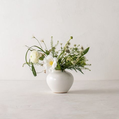 This low, round handmade vase is designed with relaxed, organic arrangements in mind. Outfit one of these darling vases with a single fresh bloom or a full bouquet. available in ivory porcelain or raw stoneware sold individually small approximate size: 4" at widest part, 3" tall medium approximate size: 6" at widest pa Full Bouquet, Sand Clay, Small Flower Arrangements, Ceramic Accessory, Mini Bouquet, Brooms And Brushes, Kitchen Display, Handmade Ceramics Vase, Round Vase