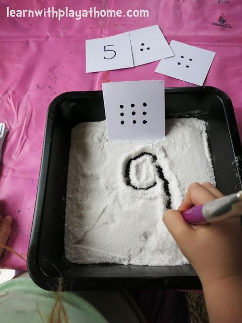 Number Writing Activity-Salt Tray Game.  What a fun way for kids to learn numbers and their value! Number Writing Activities, Early Years Maths, Number Writing, Math Numbers, Learning Numbers, Writing Numbers, Preschool Math, Math Classroom, Preschool Learning