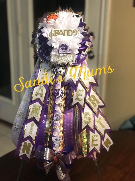 Garter For Homecoming Boys, Purple And Gold Mums Homecoming, Garter Mums Homecoming, Mum Ribbons, Mum Braids, Mum Making, Hoco Mums, Texas Mums, Football Moms