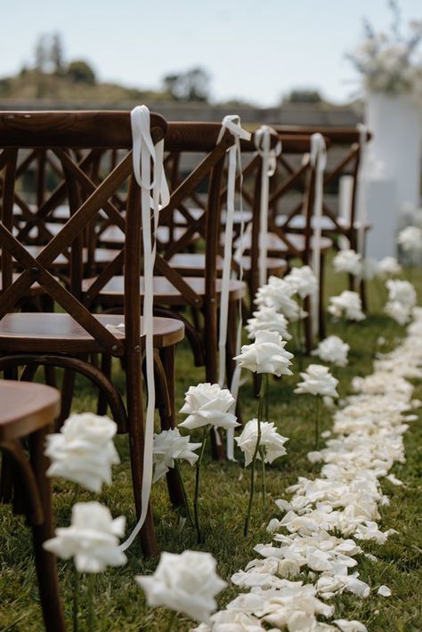 White rose ceremony flowers lining the aisle Single Rose Aisle Wedding, Flowers Lining The Aisle, White Rose Aisle, White Rose Ceremony, Flower Aisle Runner, Rose Aisle, Ceremony Flowers Aisle, Wedding Aisle Flowers, Rose Ceremony