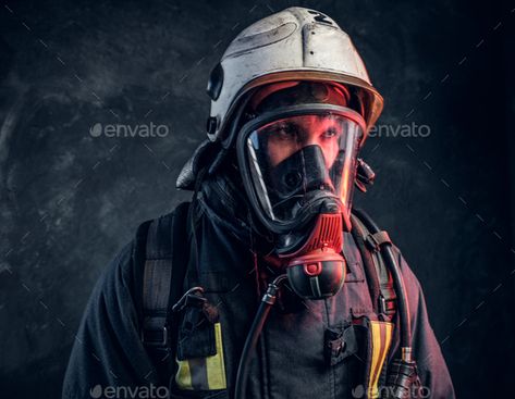 Close-up portrait of a firefighter in safety helmet and oxygen mask. by fxquadro. Close-up portrait of a firefighter in safety helmet and oxygen mask. Studio photo against a dark textured wall #Sponsored #safety, #helmet, #oxygen, #Close Firefighter Mask, Fireman Helmet, Photography References, Oxygen Tank, Oxygen Mask, Female Firefighter, Oxygen Tanks, Safety Helmet, Patterns Design