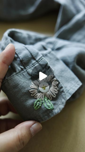 Arounna Khounnoraj on Instagram: "Adding little floral detail to my shirt cuff 🌿🌼
I used the daisy stitch for the petals, split for the leaves and a criss cross on the button.  It was simple and easy to do and made me like the shirt a lot more😆👍🏼
#embroidery" Shirt Cuff Embroidery, Cuff Embroidery, Daisy Stitch, My Shirt, Shirt Cuff, January 22, The Button, Criss Cross, Fun Crafts