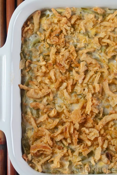 Best Ever Green Bean Casserole - A cheesier version of the traditional green bean casserole. It's made with green beans, cream of mushroom soup, fried onion rings, and Velveeta cheese (although American cheese will work too). | CDKitchen.com Velveeta Green Beans, Green Bean Casserole With Cream Of Mushroom Soup, Green Bean Casserole With Velveeta Cheese, Onion Ring Green Bean Casserole, Green Bean Casserole With Onion Rings, Green Bean Casserole With Velveeta, Green Bean Casserole Cream Of Chicken, Velveeta Green Bean Casserole, Cheesy Green Beans Velveeta