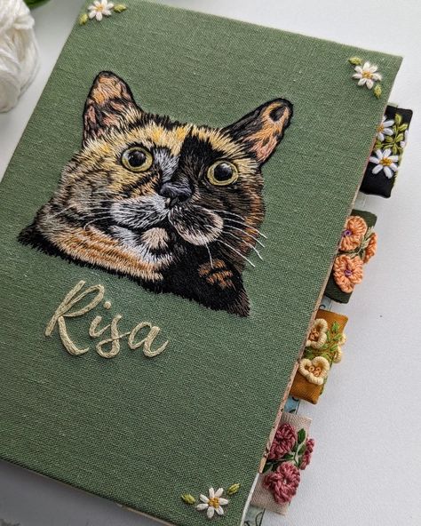 This is my very first hand-embroidered pet portrait, featuring a beautiful tortoiseshell cat named Risa. 🐱🐾 I've been feeling frustrated during the sewing process, as I thought I wouldn't be able to recreate her image, but I think it turned out nicely.💚 #handembroidery #artjournal #catlovers #cats #junkjournal #embroidery Tortoiseshell Cat Names, Tortoiseshell Cat, Textile Art Embroidery, Cat Embroidery, Tortoise Shell Cat, Self Taught, Feeling Frustrated, Little Cat, Art Embroidery