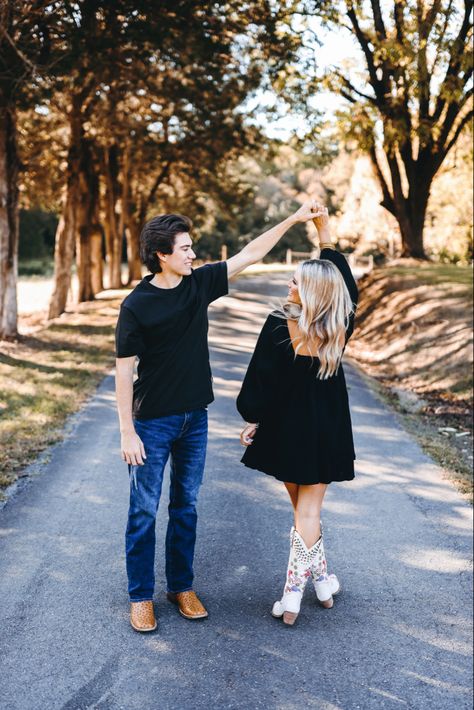 Engagement Photos Outfits Black Dress, Black Dress And Cowgirl Boots, Engagement Pictures Black Dress, Couple Photoshoot Black Dress, Engagement Photos Cowboy Boots, Engagement Photos Black Outfits, Black Engagement Photos Outfits, Black Outfit Couple Photoshoot, Black Dress Couple Photoshoot