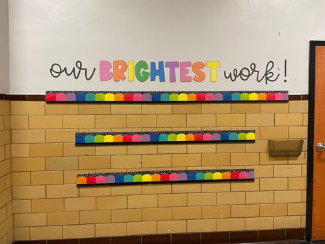 Elementary Art Wall Display, Hallway Work Display Ideas, 1st Grade Hallway Displays, Art Area Bulletin Board Preschool, Rainbow Classroom Theme Bulletin Boards, Kindergarten Work Bulletin Board, Student Art Work Display Ideas, Preschool Work Display Bulletin Boards, Bright Color Bulletin Board Ideas