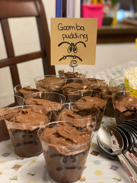 Super Mario Birthday Party Idea: goomba pudding cups #mario #supermario #supermariobirthday #birthday Mario Pudding Cups, Goomba Pudding Cups, Mario Themed Alcohol Drinks, Mario Kart Birthday Party Food, Mario Kart Food Ideas, Mario Themed Birthday Party Food, Mario Kart Food, Mario Kart Party Food, Mario Party Desserts