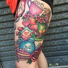 Tattoo uploaded by Stacie Mayer | Alice in Wonderland work in progress leg piece by Sami Locke. #traditional #neotraditional #AliceinWonderland #WIP #teapot #teacup #roses #flowers #SamiLocke | 208769 | Tattoodo Decorative Tattoos, Alice In Wonderland Tattoos, Teapot Tattoo, Black Ink Crew, Tea Tattoo, Alice In Wonderland Tattoo, Alice And Wonderland Tattoos, Nightmare Before Christmas Tattoo, Cup Tattoo