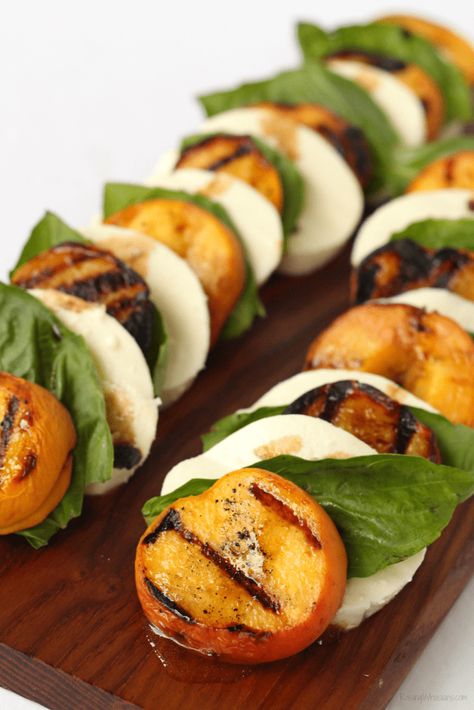 Grilled Peach Caprese Salad with Easy Key Lime Vinaigrette | Florida flavor inspired idea with homemade dressing. Made with a secret ingredient, FL peaches! #Recipe #Salad #HealthyRecipe Grilled Peach Appetizer, Grilled Peach Caprese Salad, Peach Caprese Skewers, Peach Appetizer, Peach Caprese Salad, Peach Caprese, House Concert, Caprese Salad Recipe, Caprese Skewers