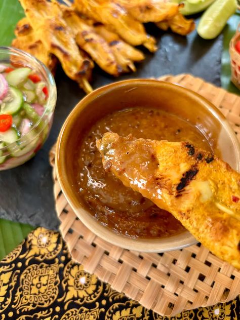 This authentic Thai chicken satay with peanut sauce recipe is the perfect blend of marinated chicken and a flavorful dip, ideal for an easy appetizer or snack. Authentic Thai Peanut Sauce Recipe, Thai Peanut Sauce Chicken, Chicken Satay Marinade, Thai Peanut Sauce Recipe, Chicken Satay With Peanut Sauce, Thai Appetizer, Peanut Sauce Chicken, Thai Chicken Satay, Pork Satay