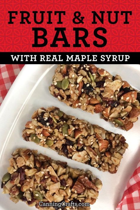 Create a delicious and healthy snack bar with our Fruit & Nut Bar recipe! Unlike store-bought bars, our recipe uses pure maple syrup for the natural sweetener. Loaded with healthy ingredients like nuts, seeds, coconut, dried fruit, and spices, you can also add protein powder for an extra nutritional boost. Get the complete, easy-to-make recipe on CanningCrafts.com today and treat your taste buds to a nutritious treat! | #maplesyrup #nuts #almonds Nut Protein Bar, No Bake Date And Nut Bars, Dried Fruit And Nut Bars, Date Nut Bars Recipe Healthy Snacks, Fruit And Nut Granola Bars, Fruit And Nut Bars Homemade, Nut And Seed Bars Healthy Recipes, Dried Fruit Bars, Recipes Using Dried Fruit