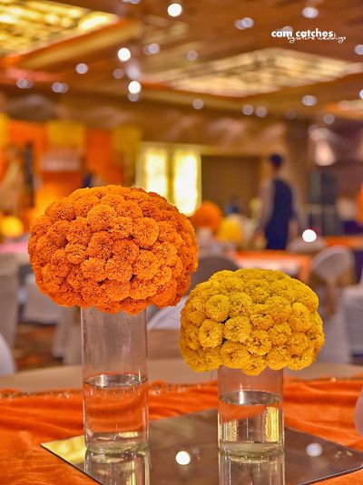 WMG: Themes of The Month Diwali Decor With Marigold Flowers, Haldi Table Centerpiece, Marigold Flower Decoration Home, Marigold Decoration At Home, Marigold Wedding Decor, Marigold Decoration, Marigold Wedding Decoration, Diwali Home Decor Ideas, Marigold Decor