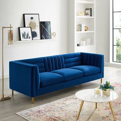 The couch! Bright blue against the much lighter tones of the room where the eyes are then led to the frames behind the couch. Denver Living, Blue Sofa Living, Velvet Sofa Living Room, Blue Sofas Living Room, Blue Couch, Casa Clean, Gold Sofa, Blue Living Room Decor, Downtown Denver