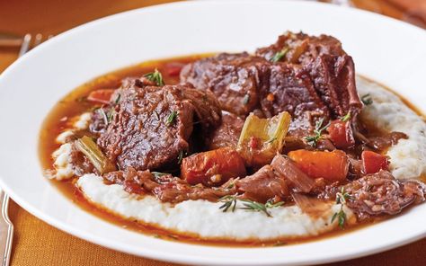 “This may be my favorite recipe ever,” says Ina Garten of this dish from her new cookbook, . “When it’s really cold, a hearty stew of beef short ribs simmered with a whole bottle of red wine, a bottle of Guinness and lots of vegetables, then served over Creamy Blue Cheese Grits, is about the [...] Best Ina Garten Recipes, Braised Short Ribs Recipe, Barefoot Contessa Recipes, Beef Short Rib Recipes, Perfect Roast Chicken, Short Ribs Recipe, Ina Garten Recipes, Croutons Homemade, Ribs Recipe