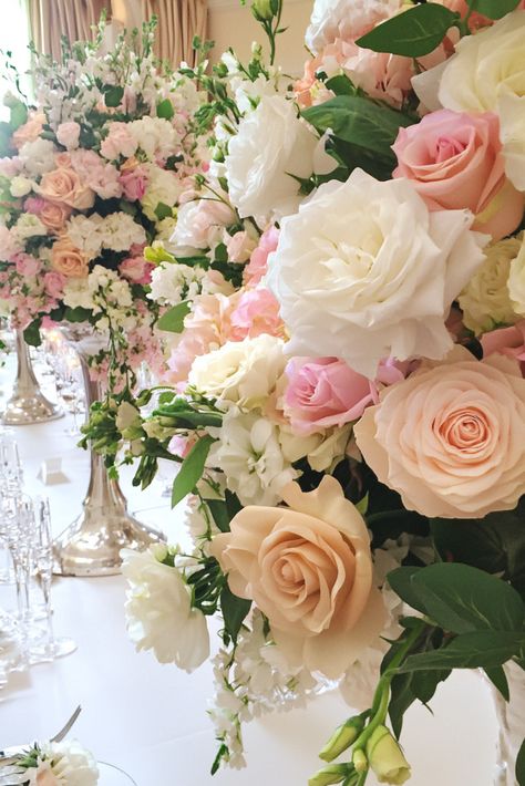 Layered Roses: The Art of Overflowing Beauty White And Pink Floral Centerpieces, Elegant Wedding Floral Arrangements, Pink Floral Centerpieces, Wedding Flowers Pink, Pink Wedding Receptions, Pink And Green Flowers, Tall Centerpieces, Ivory Roses, Pink Wedding Flowers