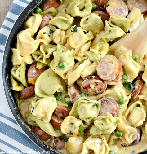 This One Pot Creamy Kielbasa Tortellini is smothered in a light cheddar cheese sauce and takes less than 30 minutes to make. Even picky eaters love it! Kielbasa Tortellini, Creamy Kielbasa, Turkey Kielbasa, How To Cook Kielbasa, Tortellini Recipe, Kielbasa Recipes, Tortellini Recipes, Cheese Tortellini, Kielbasa