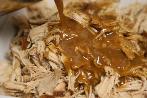 Bourbon Slow Cooked Pulled Pork - Drenching the Shredded Pork in Sauce | CookingInStilettos.com Bourbon Pulled Pork, Bourbon Pork, Clean Eating Crockpot, Crockpot Pork Tenderloin, Slow Cooked Pulled Pork, Bourbon Recipes, Pulled Pork Recipe, Whiskey Tasting, Pulled Pork Recipes