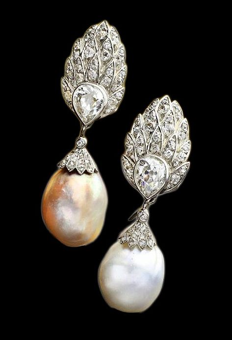 Natural Pearl and Diamond Earrings, Suzanne Belperron, circa 1935: Each surmount designed as a feather set with circular-cut diamonds and a pear-shaped diamond, supporting a detachable pendant set with a baroque drop shaped natural pearl measuring ~17.50 x 13.10 x 11.90mm and 16.00 x 13.45 x 11.60mm respectively, capped with rose diamonds, French assay marks, maker's marks for Groene et Darde. Suzanne Belperron, Detachable Pendant, Conch Pearl, Diamond Girl, Ear Clips, Pearl And Diamond Earrings, Natural Pearl, Pear Shaped Diamond, Natural Pearls