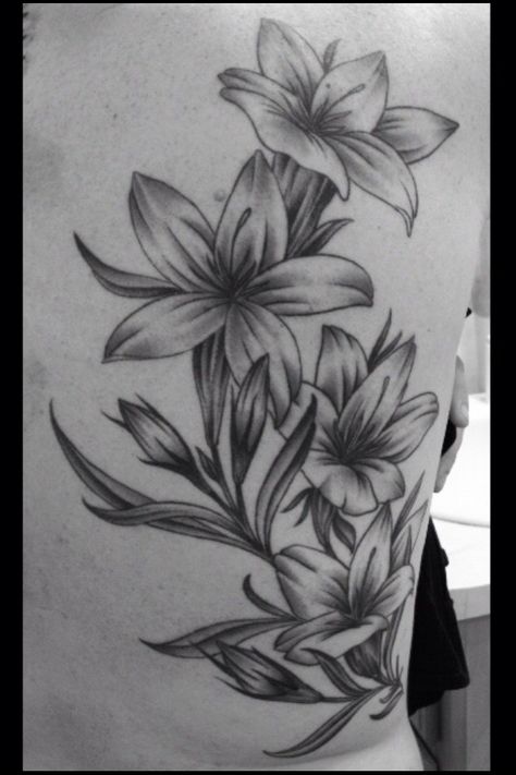 Lilies on my back. Spine Tattoo, Tat Ideas, Flower Tattoo, Tatting, Old School, Lily, Tattoos, Hair, Pins