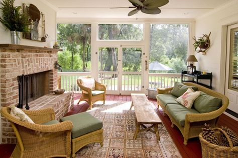 Cozy sunroom with brick fireplace and wicker furniture Indoor Sunroom Furniture, Sunroom With Fireplace, Indoor Sunroom, Sun Crown, Small Sunroom, White Wall Paint, 4 Season Room, Interior Brick, Sunroom Furniture