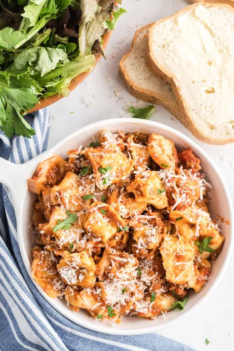 Turn a package of cheese tortellini into a delicious, satisfying meal in about 30 minutes. This Meaty Tortellini Skillet has a simple but super flavorful meat sauce and is topped with plenty of Parmesan cheese. #tortellini #onepotpasta #pasta #onepot #easydinnerrecipes #easydinner Tortellini Skillet, Cheese Tortellini Recipes, Meat Lovers Pizza, Meat Sauce Recipes, Tortellini Recipes, Tortellini Pasta, Lasagna Pasta, Tasty Meat, Cheese Tortellini