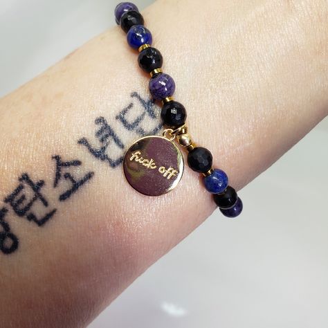 😁 SUGA inspired stretch bracelet with gemstones, gold hematite spacer beads and an 18k gold filled f*ck off charm. Size 6.75" https://bludolfincreations.etsy.com/listing/1782012208 #SUGA #MinYoongi #AgustD Inspired Jewelry, Stretch Bracelet, Spacer Beads, Stretch Bracelets, Gold Filled, 18k Gold, Size 6, Bts, Bracelet