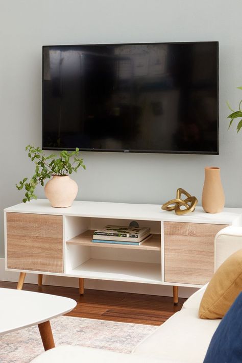 7 Clever Ways to Hide TV Cords Wall Mounted Tv Cable Management, Mounted Tv Cable Management, Accent Wall To Hide Tv Cords, Cord Hiding Ideas Mounted Tv, Hide Fire Alarm On Wall, Tv Cords Hide Ideas, Decor To Hide Tv Cords, How To Hide Tv Cords Above Fireplace, Style Around Tv