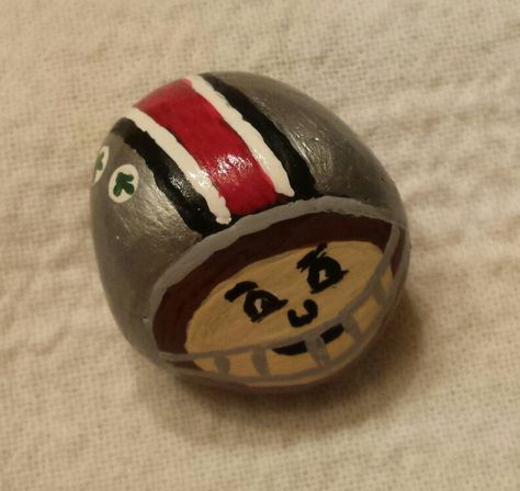 Ohio State Brutus painted rock. Football Painted Rocks, Buckeye Projects, Ohio State Brutus, Ohio State Crafts, Buckeye Crafts, Anniversary Gift Ideas For Him Boyfriend, Tailgate Ideas, Teacher Crafts, Succulent Painting