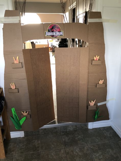 Jurassic Park Photo Booth, Jurassic Park Props, Jurrasic Park Birthday Party Decor, Diy Jurassic Park Gate, Jurassic Park Gate Entrance Diy, Homecoming Hallways, Jurassic Park Gate, Candy Land Decor, Jurassic Park Theme