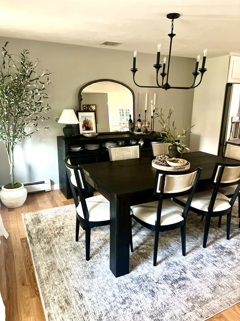 This beautiful dining room features pottery barn table and sideboard, birchlane chairs and a shades of light chandelier.  Love all the decor we added from homesense, target and magnolia. Black Dining Room Table Decor, Black Dining Room Table, Pottery Barn Table, Barn Table, Room Table Decor, Black Dining, Dining Room Table Decor, Black Dining Room, Room Upgrade