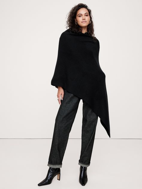 Crafted with our signature soft and warm cashmere, this poncho-style wrap is designed to layer easily.  Good Cashmere Standard™: The cashmere for this product is produced according to the Good Cashmere Standard™, which aims to improve the welfare of the cashmere goats, protect natural resources, and support local farmers. Black Poncho Outfit, Poncho Outfit, Support Local Farmers, Black Poncho, Sweater Poncho, Jumper Outfit, Cashmere Poncho, Poncho Style, Poncho Sweater