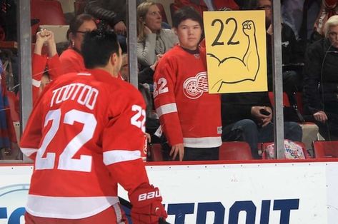 Some NHL fans get highly creative with the signs they bring to games in their attempts to get noticed. We've chosen 10 from over the years that made us chuckle. Hockey Fan Signs For Games, Hockey Awards, Game Signs, Women Hockey, Power Rankings, Detroit Red Wings Hockey, Red Wings Hockey, Nhl Games, Hockey Game