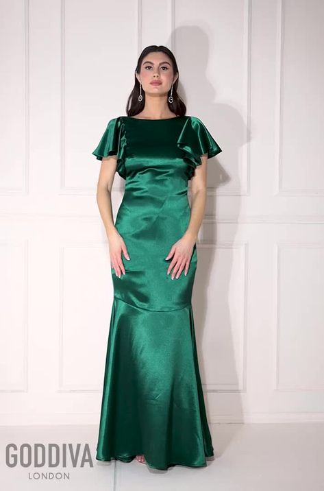 ​The epitome of elegance and sophistication. Our stunning emerald satin flutter sleeve mermaid maxi is designed with meticulous attention to detail, this exquisite dress is the perfect choice for any special occasion. Crafted from luxurious satin fabric, this emerald maxi dress drapes gracefully, creating a mesmerising silhouette that will leave a lasting impression. The satin material adds a touch of lustrous beauty, making it a standout piece for evening events, weddings, and even as a stunnin Satin Dressing Gown, Glamorous Evening Dresses, Satin Dress Long, Dress Drape, Glamorous Dresses, Pink Maxi, Satin Gown, Chiffon Maxi, Dressing Gown