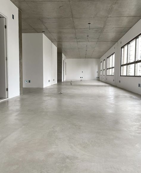 Exposed Concrete Floor, Concrete Floors Office, Office Concrete Floor, Concrete Office Interior, Exposed Concrete Ceiling, Exposed Concrete Interior, White Concrete Floors, Brutalism Interior, Concrete Office