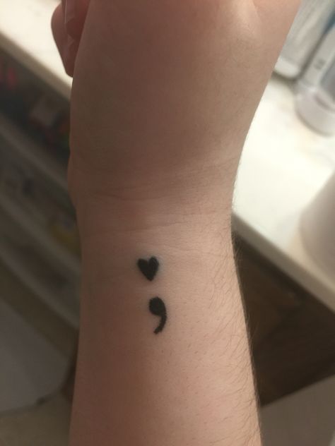 Cute semicolon heart wrist tattoo! Semicolon Nails, Semi-colon Tattoo Ideas Cute, Semi-colon Tattoo Pretty, Seni Colon Tattoo, Heart With Semicolon Tattoo, Heart Semicolon Tattoo, Semicolon Wrist Tattoo, Hidden Semi-colon Tattoo Ideas, Heart Semi-colon Tattoo Ideas