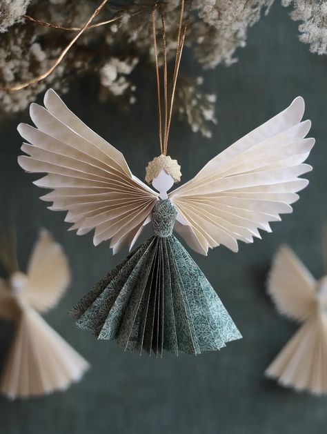 Curious about how to craft the perfect holiday ornament? Discover unique handmade angel designs that will elevate your Christmas decor. From wooden peg angels to elegant macrame creations, this post gives you step-by-step instructions for creating beautiful ornaments that will leave everyone in awe! Christmas Crafts Angels, Diy Paper Birds Craft Ideas, Christmas Angels Crafts, Angel Paper Craft, Christmas Crafts Diy Projects Unique, Angel Diy Crafts, Angel Crafts Christmas, Handmade Angel Ornaments, Paper Angel Ornaments