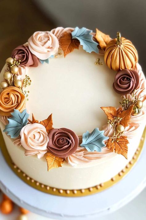 26 Fall Cake Decorating Ideas To Wow Your Guests This Season Fall Cake With Flowers, Pink Fall Cake, Fall Wreath Cake, Fall Theme Cake Ideas, Pretty Fall Cakes, Fall Cake Ideas Decorating, Fall Floral Cake, Fall Mini Cakes Ideas, Fall Decorated Cakes