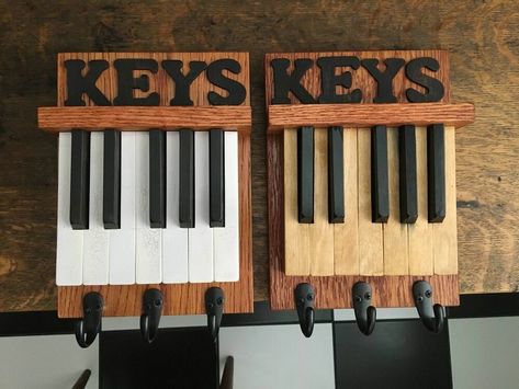 Comments and questions on an earlier posting suggested interest in what was done with the left-over keys from a piano repurposing project.  As stated in that posting (https://www.hometalk.com/43336777/piano-repurposed-into-a-bookcase) the clients wished to have them repurposed into key racks for siblings. The purpose of this posting is to show the results and discuss some key points (pun intended) encountered in the process.  Most of my projects are one-of-a-kind. Doing seven sets at… Things To Do With Old Pianos, Crafts With Piano Keys, What To Do With Old Piano Keys, Old Piano Keys Repurpose Ideas, Piano Keys Repurposed, Piano Parts Repurposed, Piano Key Coat Rack Diy, Piano Upcycle Creative Ideas, Piano Shelf