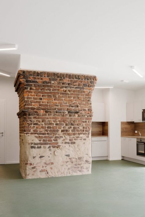 Exposed brick and white-painted walls feature on the interior. White Brick Office, Brick Studio, Factory House, Youth Club, Exposed Brick Walls, Painted Walls, Adaptive Reuse, Room Deco, White Brick